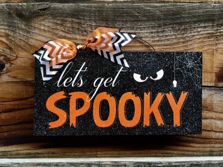 Let’s get Spooky. Halloween sign. Hot on Sale