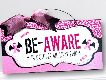 Be Aware Breast cancer awareness Halloween sign. Online