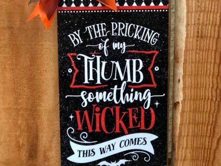 Something wicked this way comes sign. Fashion